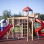 Twister castle with slide dans une aire de jeux